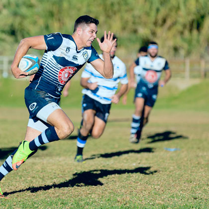 man playing rugby